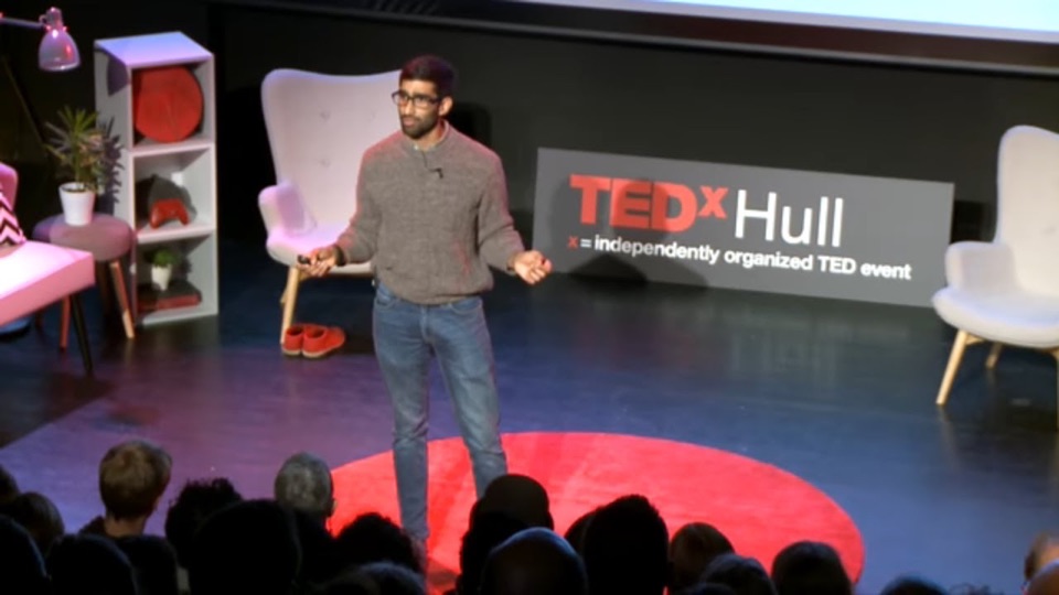 Dileepa Ranawake speaking on the TEDxHull stage
